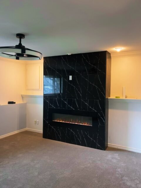 Old tile out. New flame in. 🔥

This fireplace got a full glow-up: reframed, wired for a linear electric flame, and wrapped floor to ceiling in a sleek marble-look finish that makes the whole room feel elevated.

Swipe to see what it took to reach the final finished design!

#EnactPro #Renovation #FireplaceRemodel #ModernDesign #vancouver
